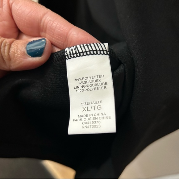 Black Mini Dress with Cut-Out Sides - Picture 5 of 5